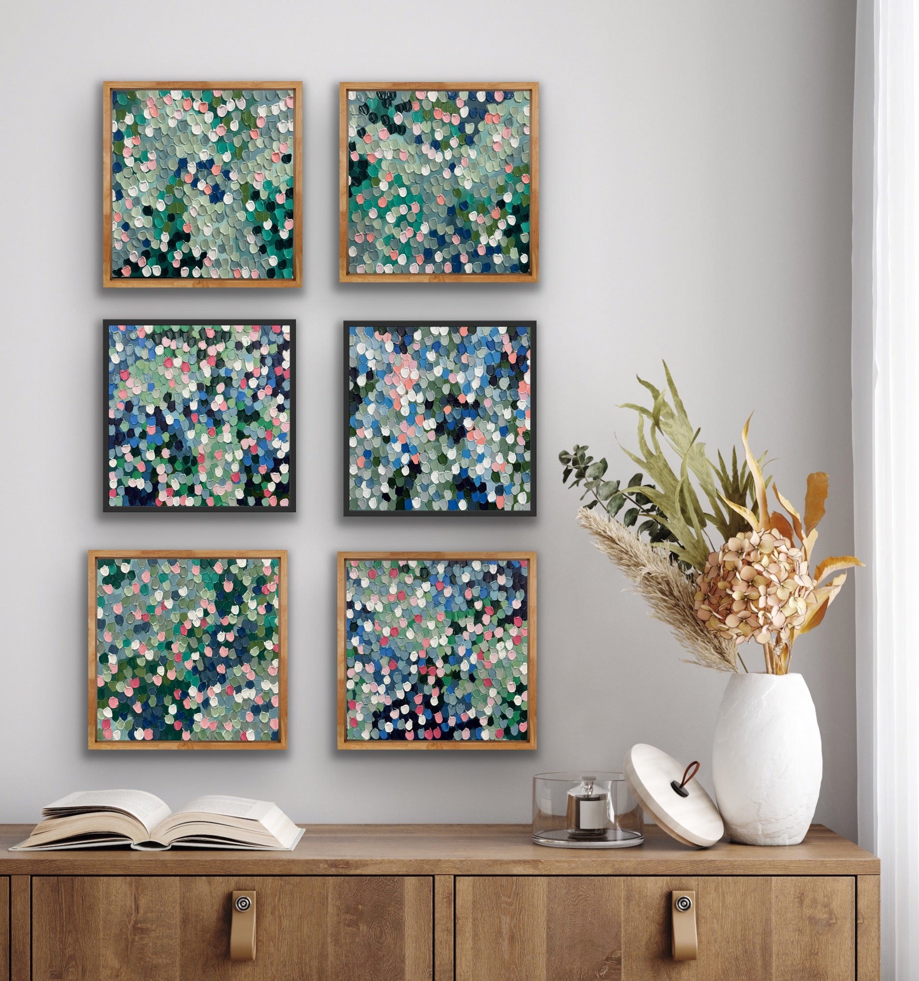 petite paintings on wall